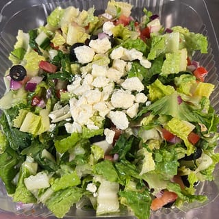 Greek Salad -- (Lettuce, onions, tomato, cucumber, B Olives, and feta with greek dressing)