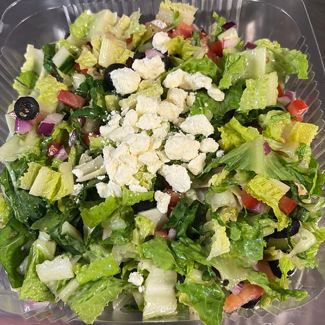 Greek Salad -- (Lettuce, Onions, Tomato, Cucumber, B Olives, and Feta with Greek Dressing).